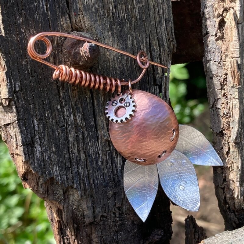 Copper, aluminium and found object brooch
