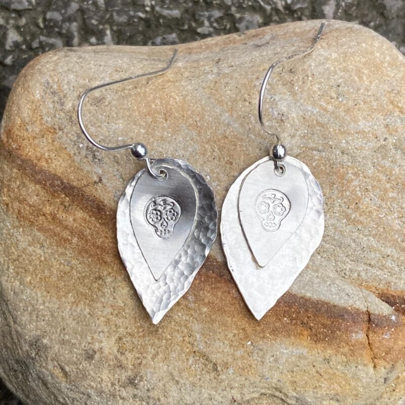 Silver double layer earrings with skull stamp and hammered texture