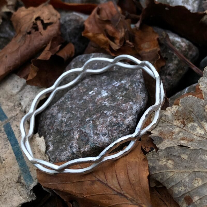 Silver double bangle with wavy detail
