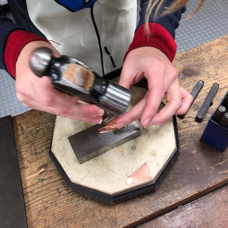 Stamping copper in the workshop