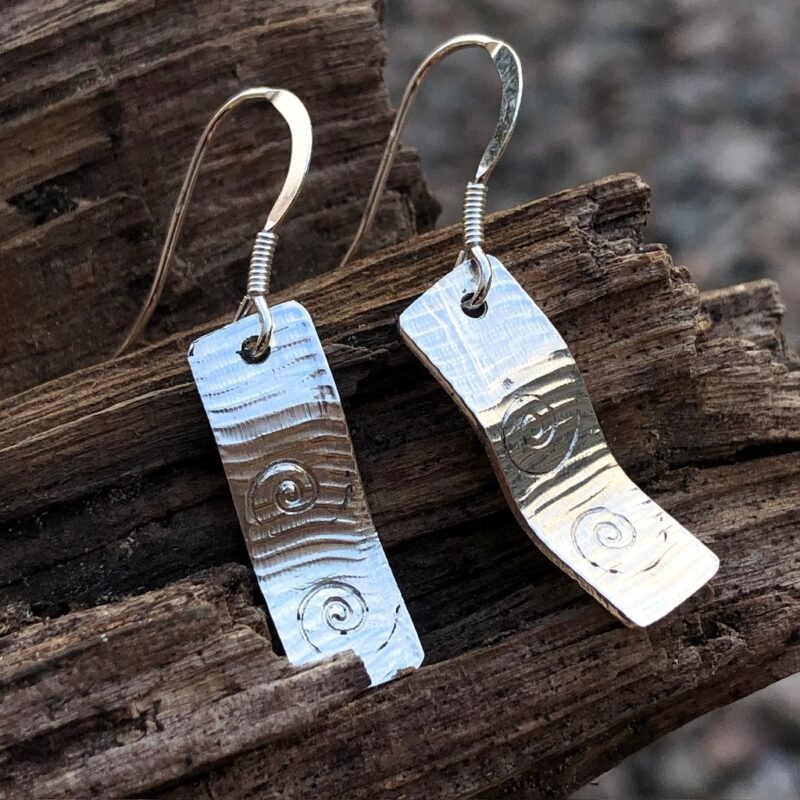 Silver earrings with texture and swirly stamp